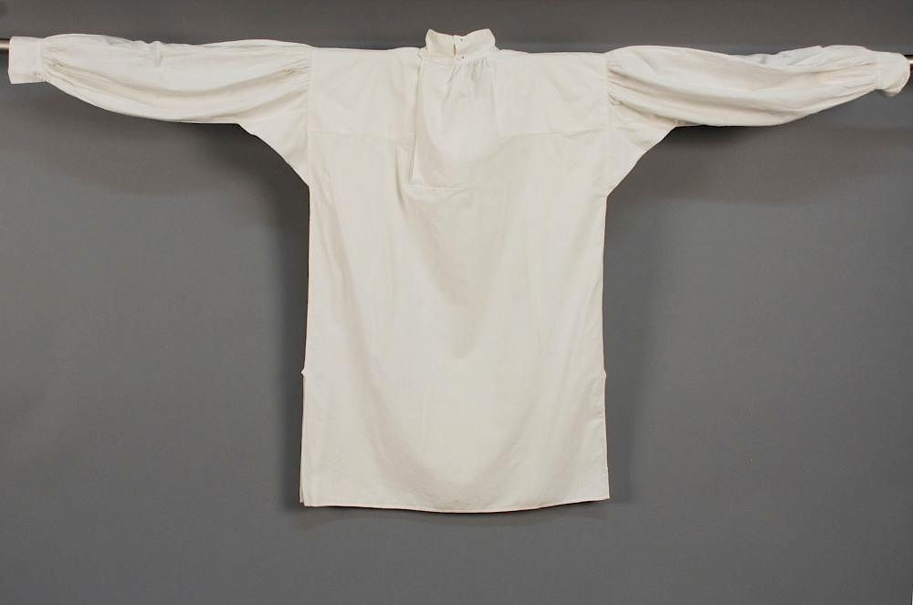 Appraisal: GENTS RUFFLED COTTON SHIRT th C Hand sewn square-cut fine