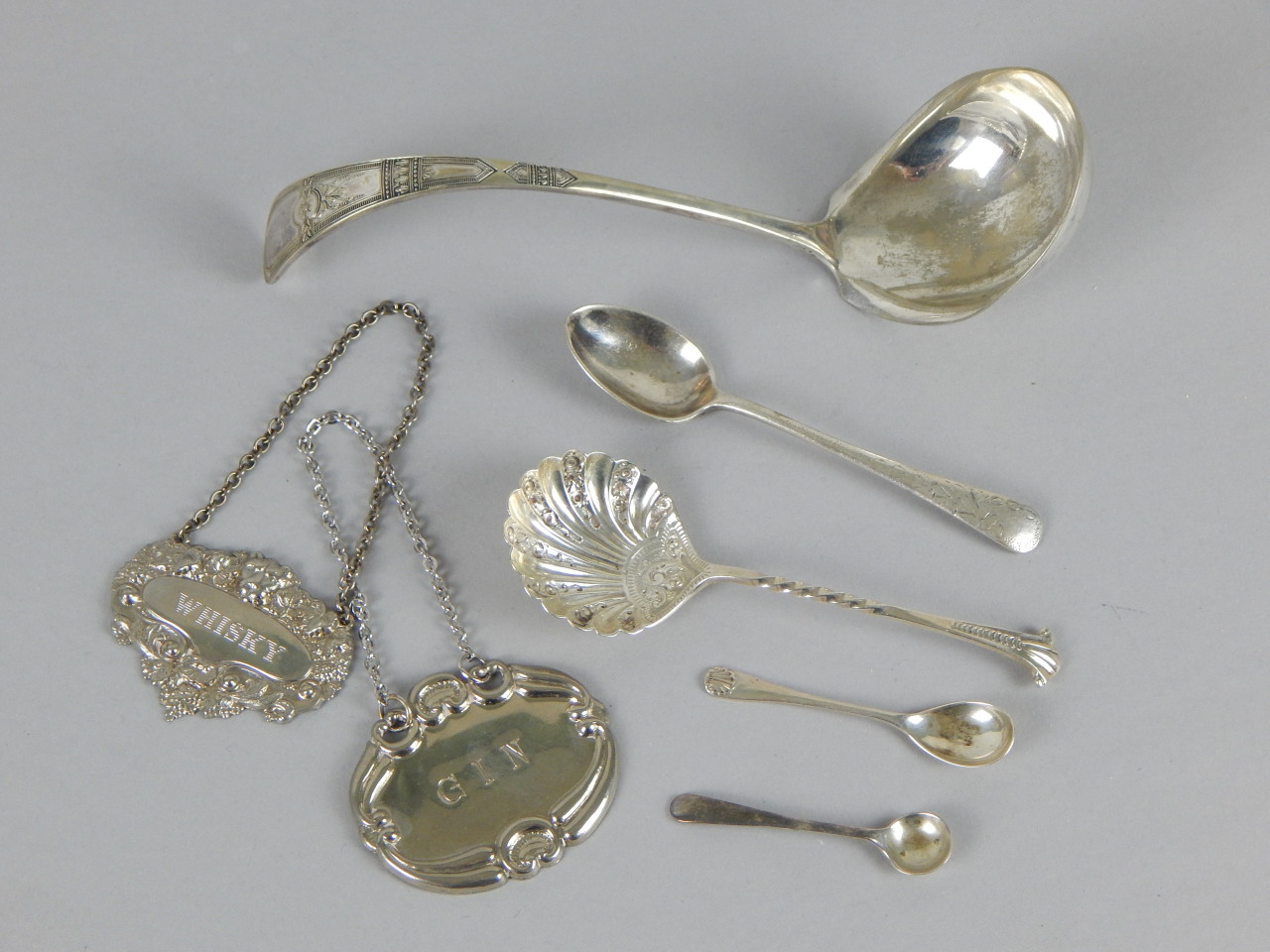 Appraisal: Various cutlery and decanter labels to include a silver plated