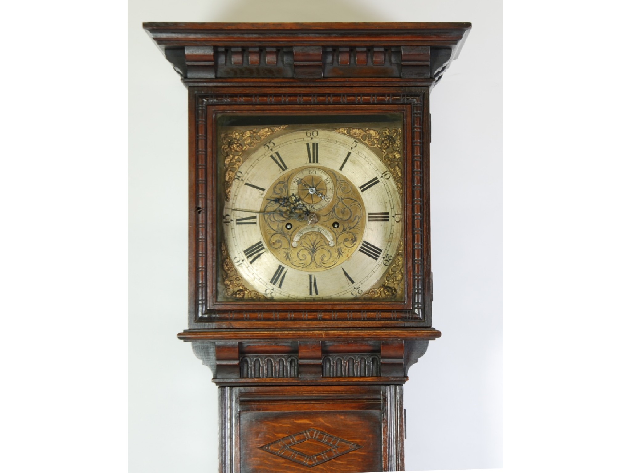 Appraisal: 's JACOBEAN REVIVAL OAK LONGCASE CLOCK CONTAINING AN EIGHTEENTH CENTURY