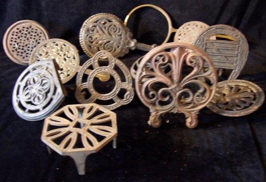 Appraisal: Twelve wrought and cast iron trivets various