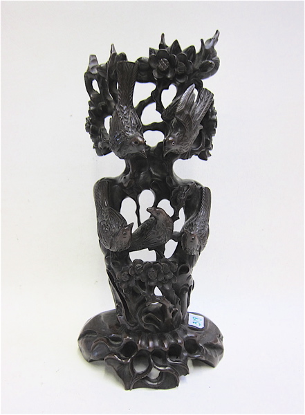 Appraisal: CHINESE CARVED HARDWOOD FIGURAL GROUP of birds on carved wood