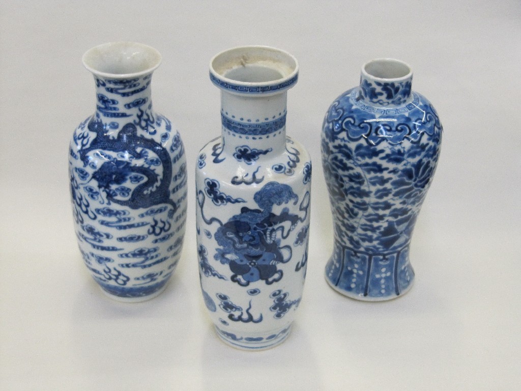 Appraisal: Three Chinese blue and white vases two decorated with dragons