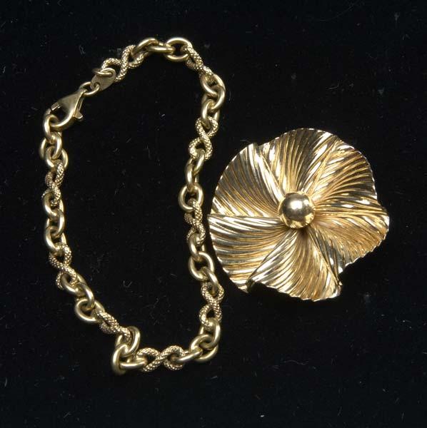 Appraisal: GOLD JEWELRY Two pieces ruffled ribbon brooch in k yg