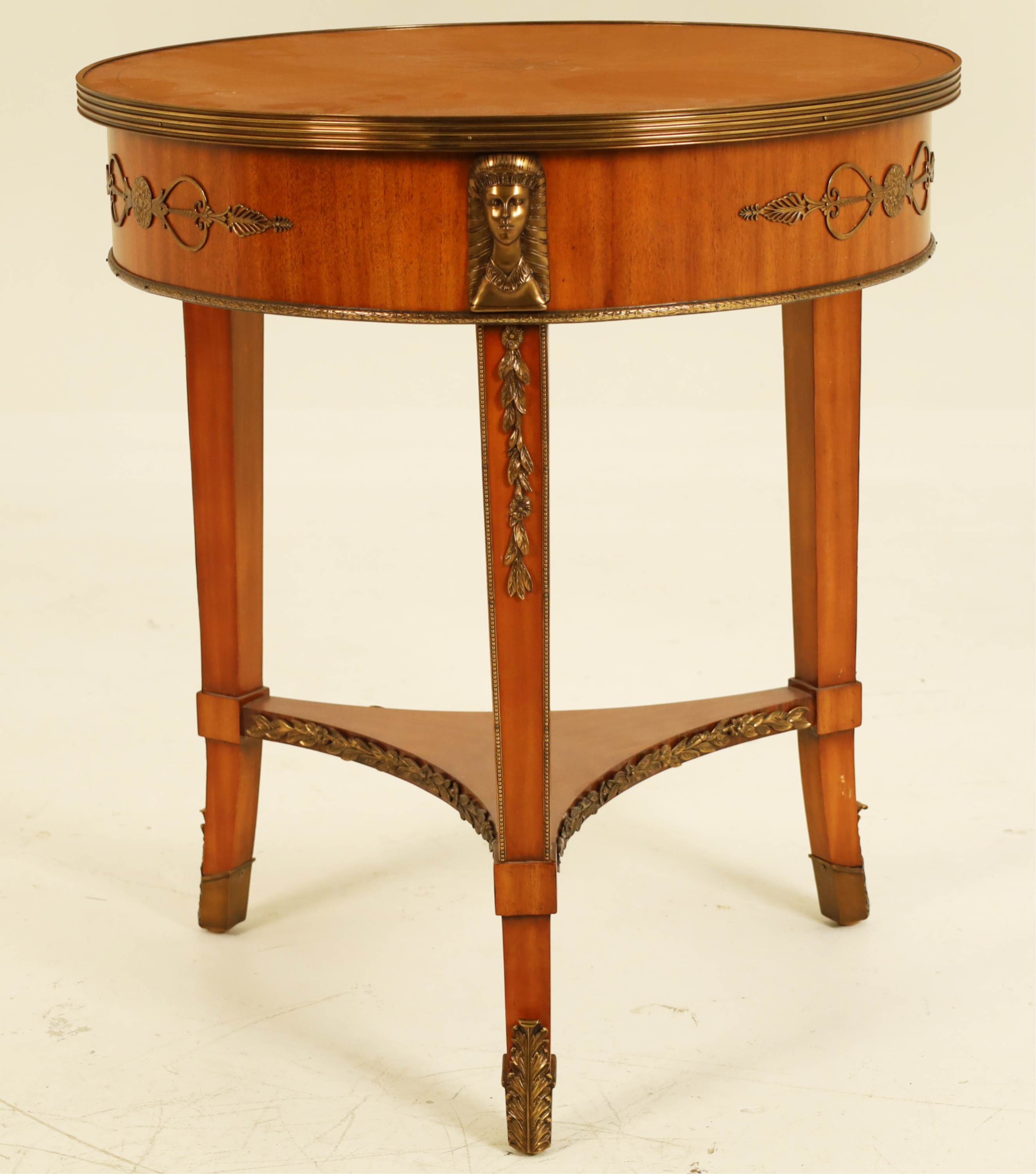 Appraisal: FRENCH REGENCY STYLE MAHOGANY SALON TABLE French Regency style mahogany