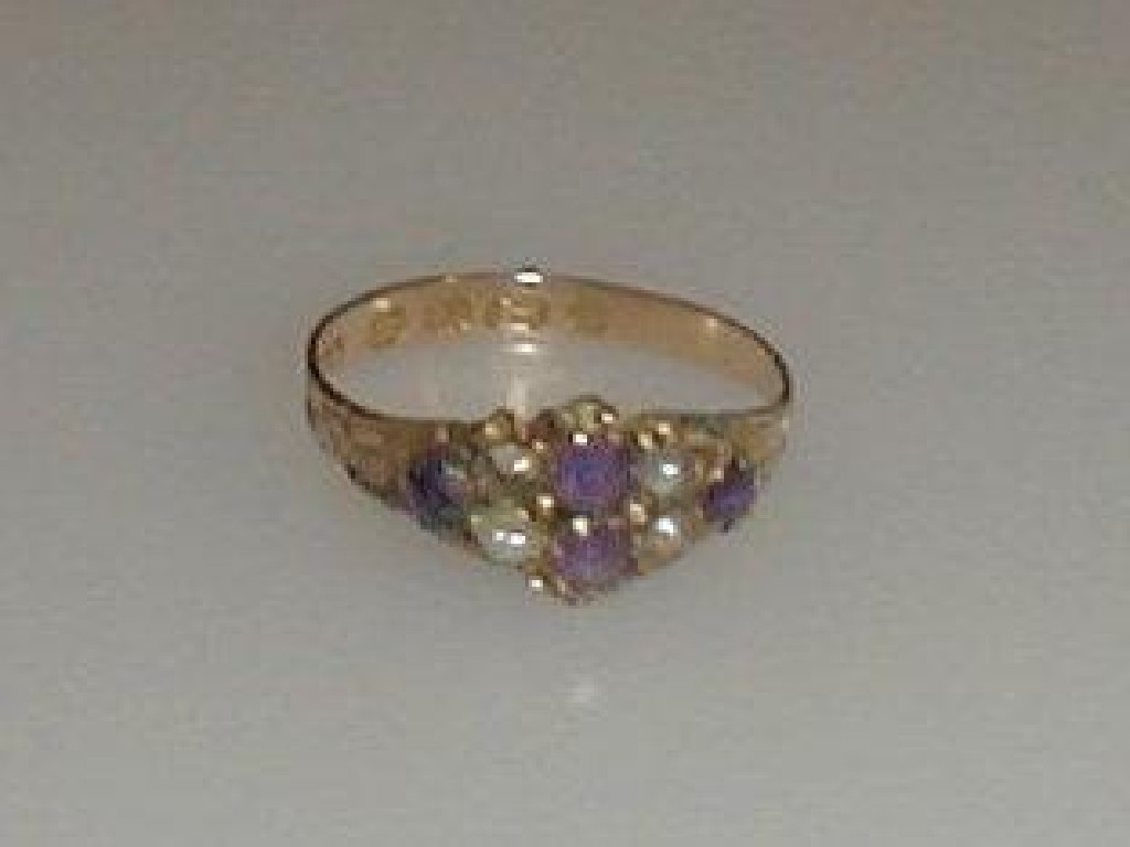 Appraisal: A Victorian amethyst and seed pearl one missing set ring