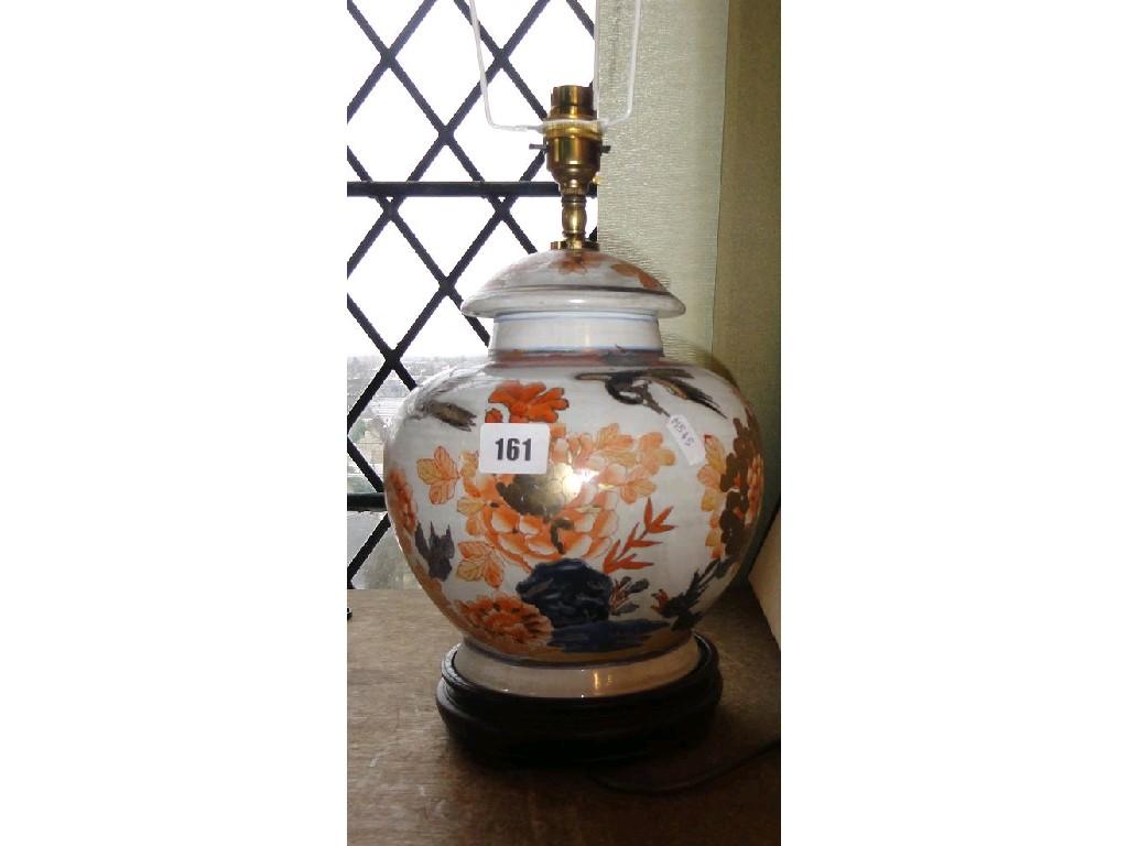 Appraisal: A ceramic lamp base in the Imari style with painted