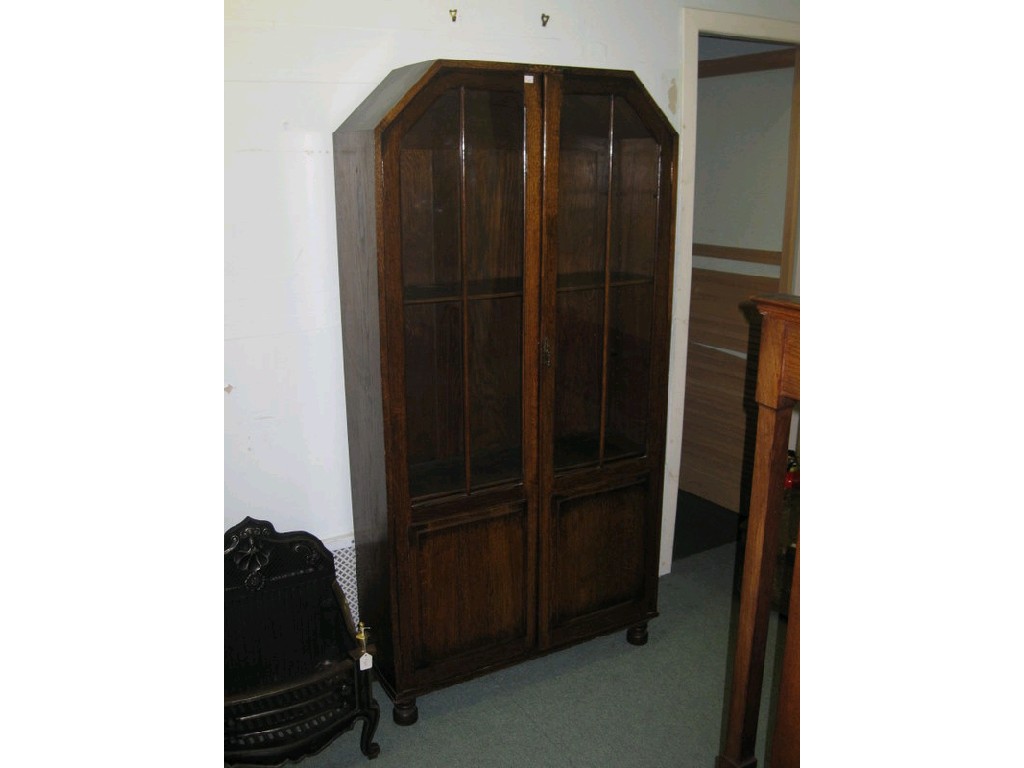 Appraisal: Oak glazed door bookcase