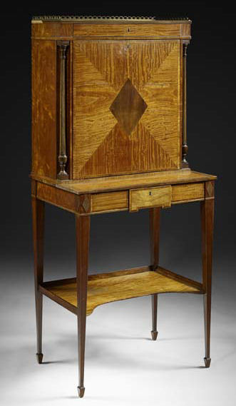 Appraisal: A George III satinwood mahogany and crossbanded writing cabinet circa