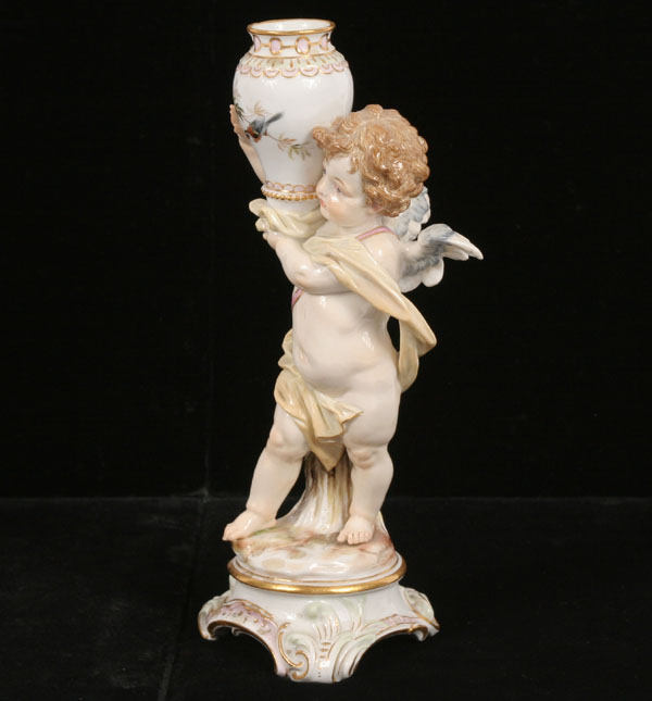 Appraisal: Meissen th Century porcelain figure of a draped cherub carrying