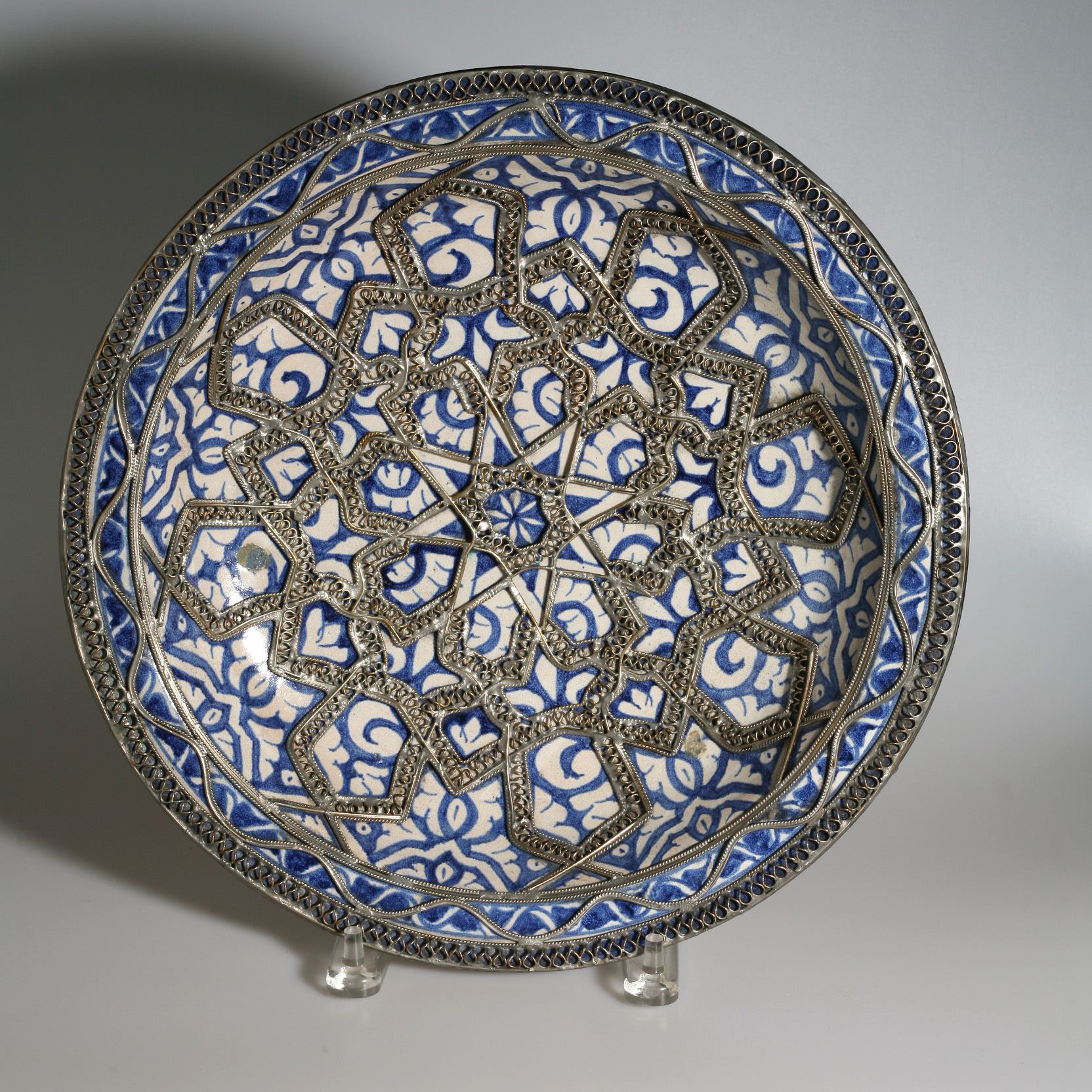 Appraisal: EARLY FAIENCE DEEP DISH WITH BLUE MOORISH DECORATION AND INTRICATE