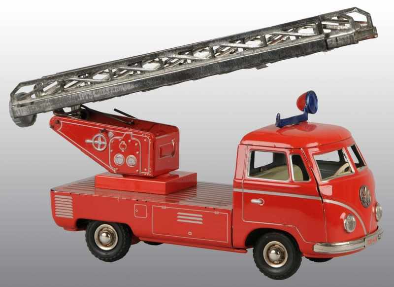 Appraisal: Tin Tippco Volkswagen Fire Truck Friction Toy Description German Not