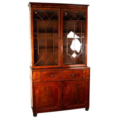 Appraisal: A large George IV mahogany and inlaid secretaire bookcase the