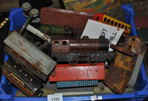 Appraisal: A quantity of tinplate O-gauge rolling stock with track and