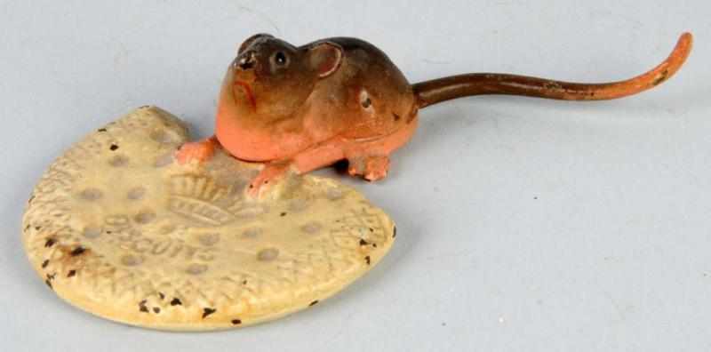 Appraisal: Cast Iron Mouse Biscuit Paperweight Description English Advertising Crown Biscuits