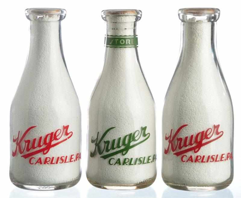 Appraisal: Lot of Kruger Dairy Milk Bottles Description Carlisle PA Condition