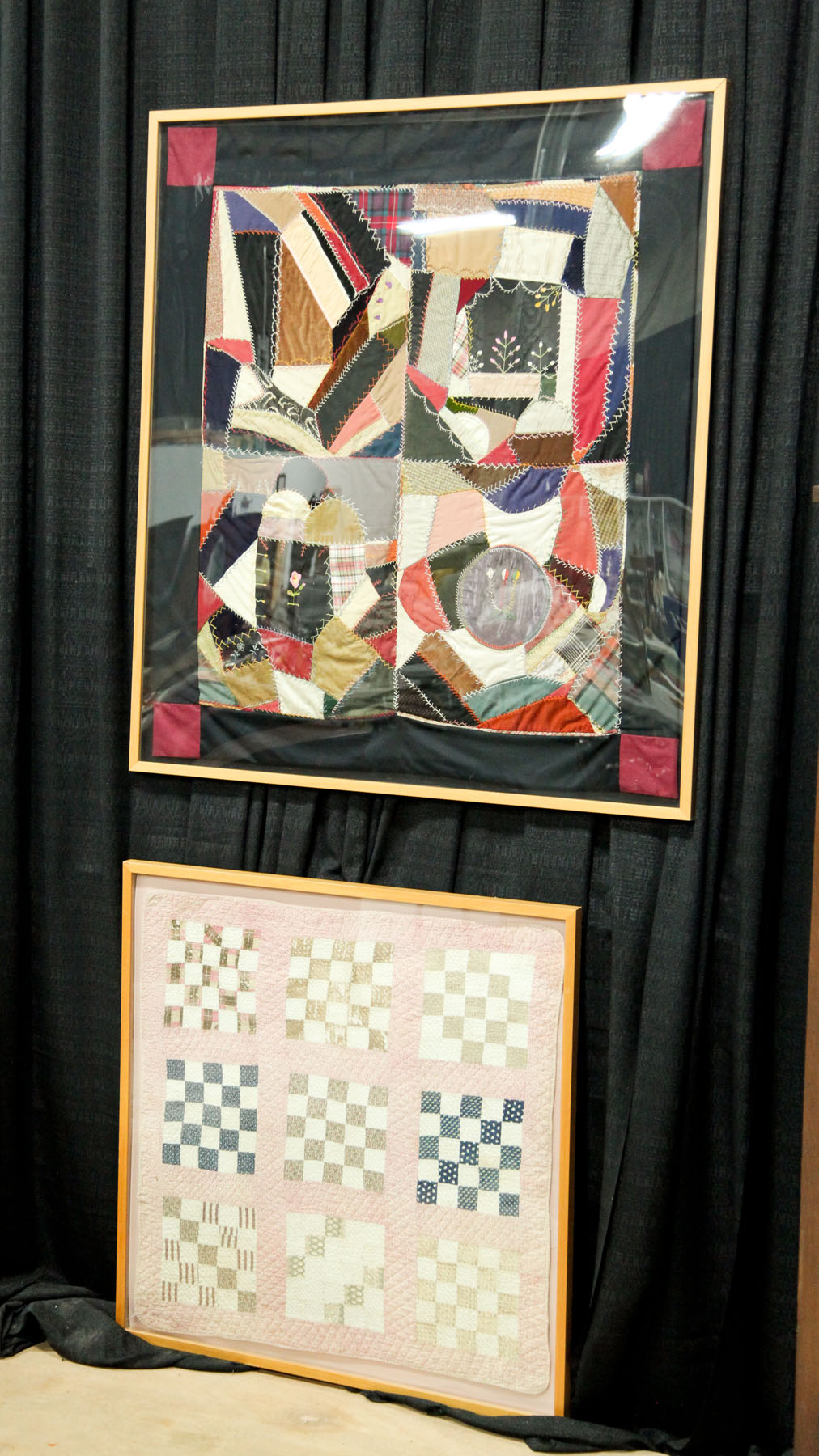 Appraisal: TWO FRAMED QUILTS American late th- th century Nine patch