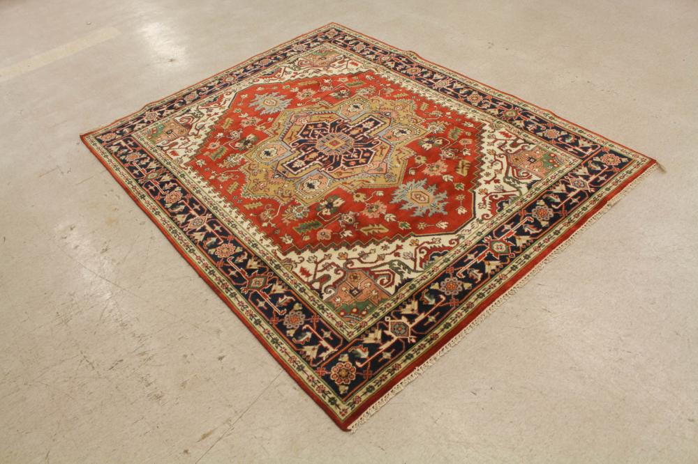 Appraisal: HAND KNOTTED ORIENTAL CARPET Persian Serapi or Heriz design on