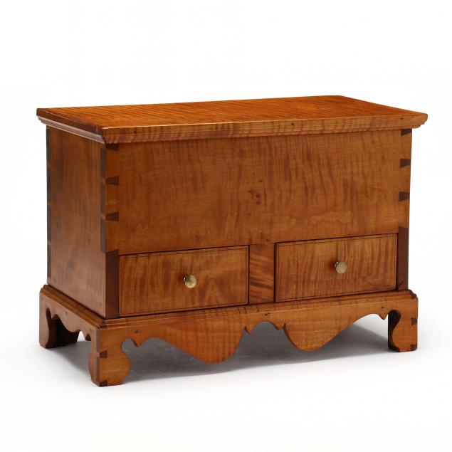 Appraisal: BENCH MADE PENNSYLVANIA CHIPPENDALE STYLE MINIATURE TIGER MAPLE BLANKET CHEST