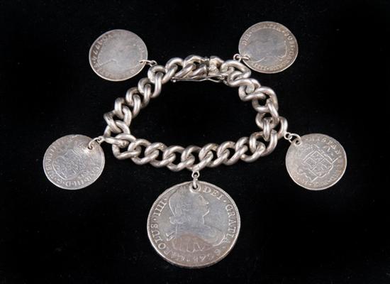 Appraisal: SPANISH SILVER COIN CHARM BRACELET Five coins dating On a