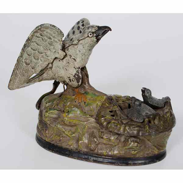 Appraisal: Cast Iron Eagle On Nest Mechanical Bank Rare cast iron