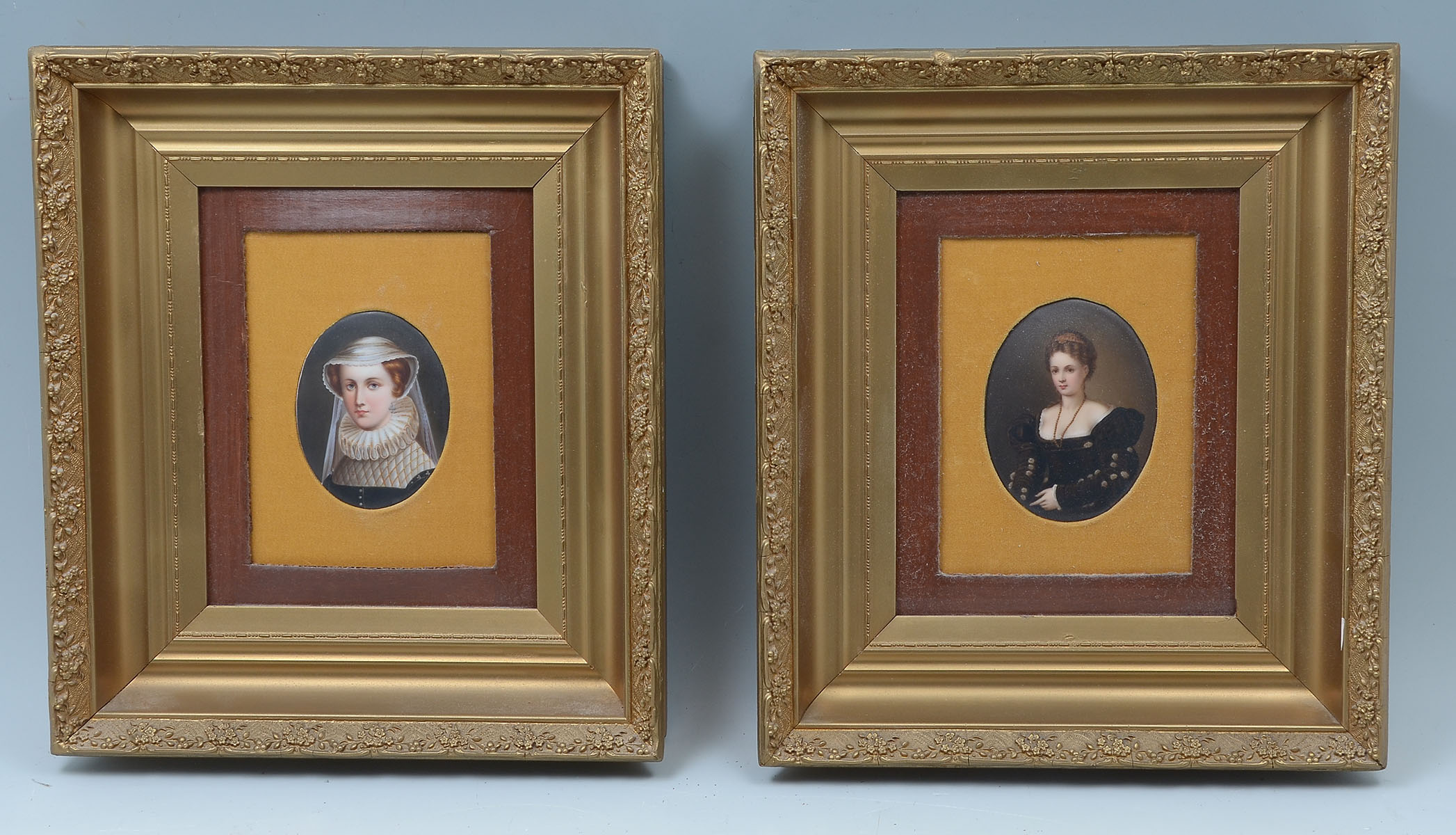 Appraisal: PAIR OF MINIATURE PAINTINGS ON PORCELAIN PORTRAITS OF YOUNG WOMEN