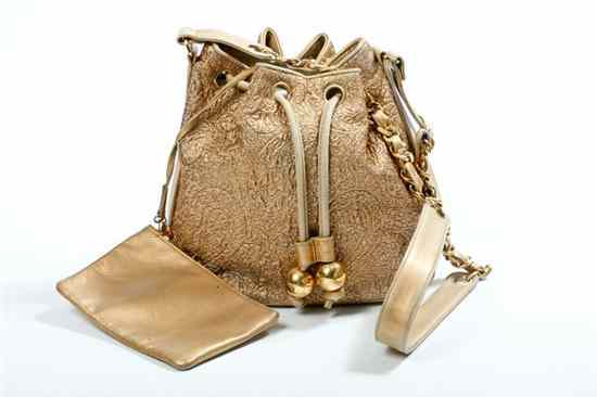 Appraisal: CHANEL GOLD BROCADE AND LEATHER HANDBAG s Bucket-style beige leather