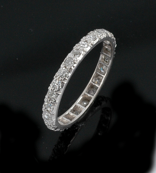 Appraisal: A diamond full circle ring The platinum eternity ring grain