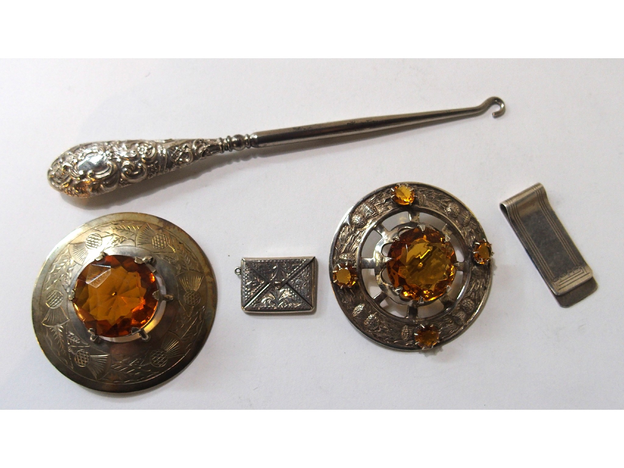 Appraisal: A lot comprising a silver and Cairngorm plaid brooch a