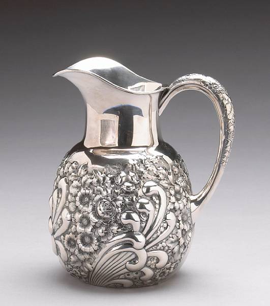 Appraisal: A sterling water pitcher with chased decorationGeorge W Shiebler amp