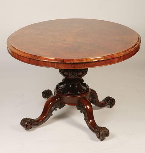 Appraisal: A VICTORIAN BURR WALNUT VENEERED LOO TABLE the oval top