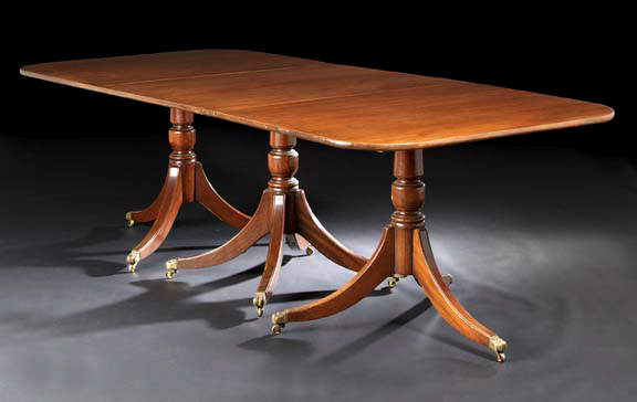 Appraisal: George III-Style Mahogany Dining Table the rounded rectangular top raised