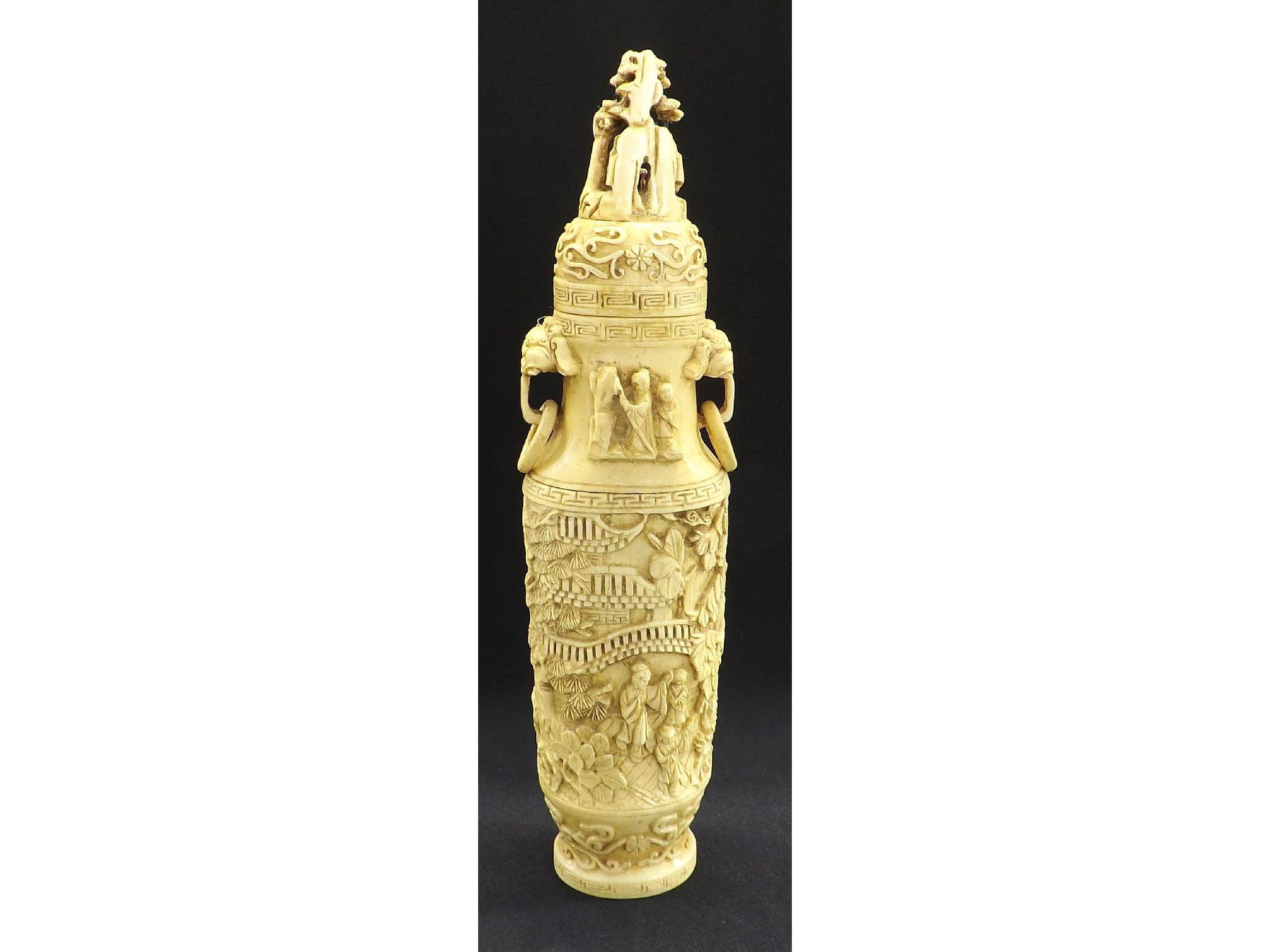 Appraisal: Fine carved ivory cylindrical tapering vase and cover decorated overall