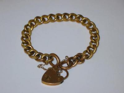 Appraisal: A CT GOLD BRACELET having alternating textured curb links and