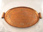 Appraisal: An Arts and Crafts Art Nouveau hammered copper oval tray