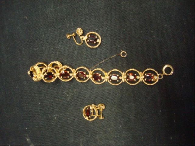 Appraisal: K Gold Bracelet and a Pair of Earrings with Garnets