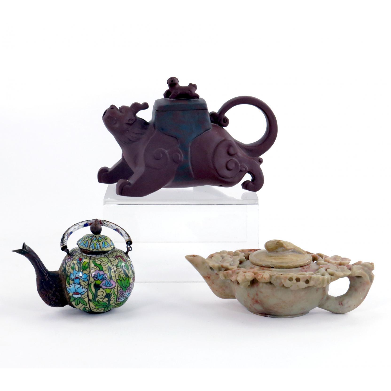 Appraisal: Three Asian Teapots including a Yixing teapot in the form