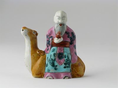 Appraisal: A Chinese famille rose water dropper modeled as Shoulao seated