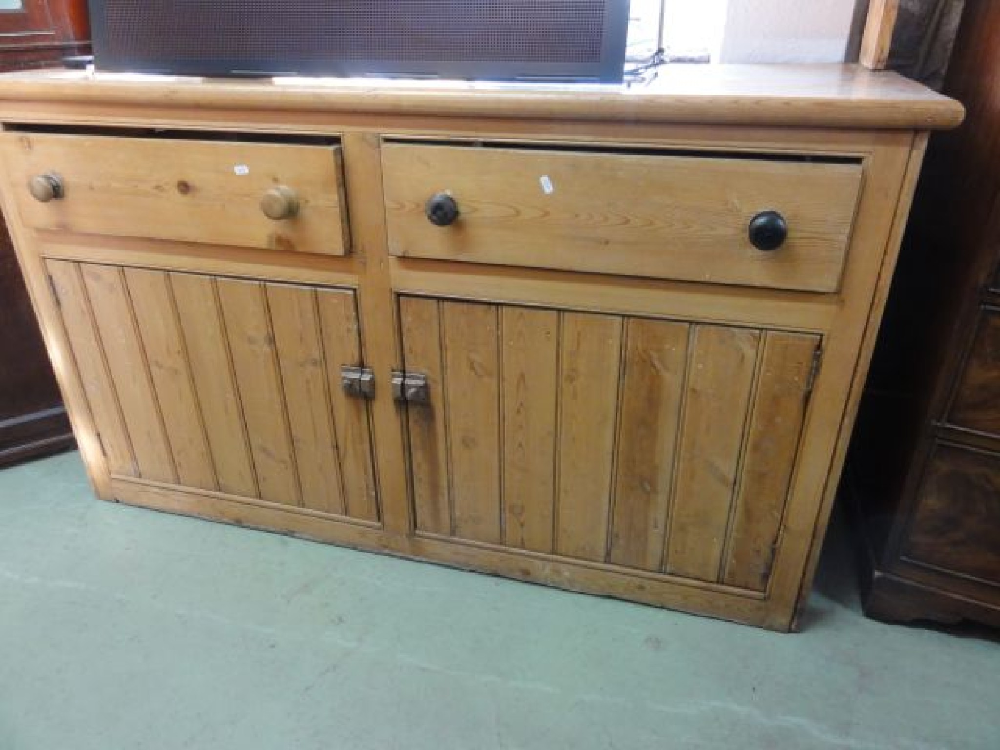 Appraisal: A vintage stripped pine kitchen dresser the base enclosed by