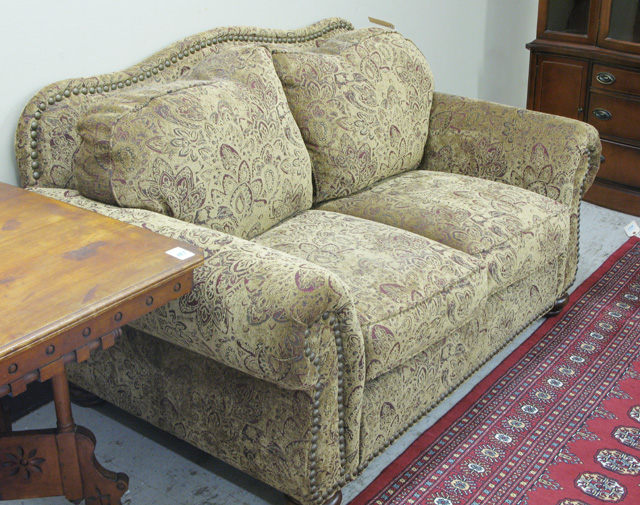 Appraisal: TRADITIONAL STYLE LOVESEAT with -cushion seat and back between padded