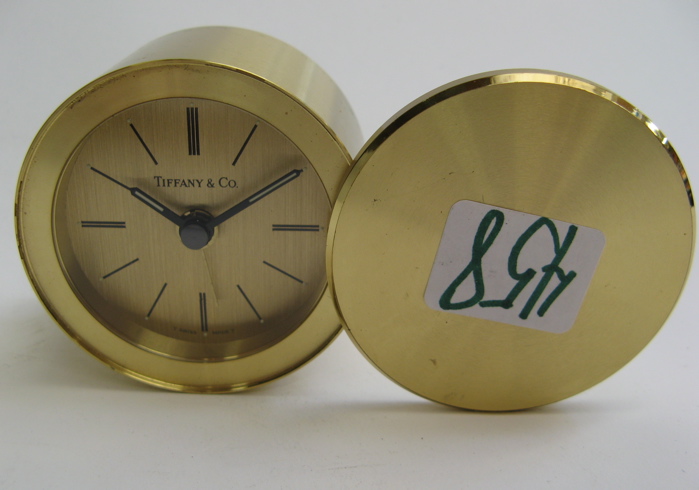 Appraisal: TIFFANY CO GILT METAL TRAVEL ALARM CLOCK having a Swiss