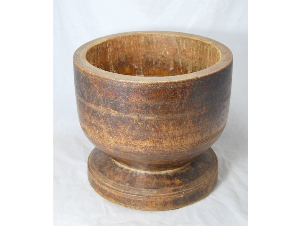 Appraisal: A turned and hollowed wood wassail style bowl dia x