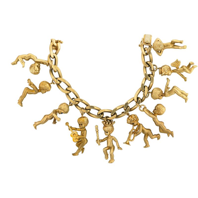 Appraisal: SUBSTANTIAL K GOLD CHERUB CHARM BRACELET Condition Report Some jewel