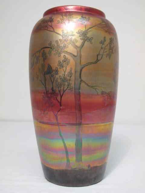 Appraisal: Weller Lasa vase with deep rainbow iridescence and treed landscape