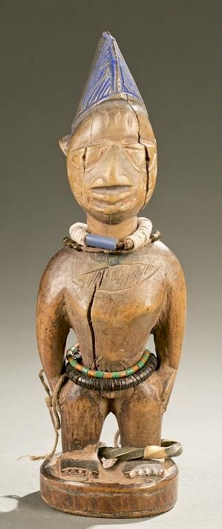 Appraisal: Yoruba Ibeji figure th century A polychrome standing Ibeji figure