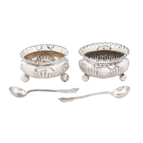 Appraisal: A pair of Victorian silver salt cellars with crimpled rim