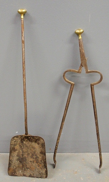 Appraisal: - Delicate pair of wrought iron fireplace tools with brass