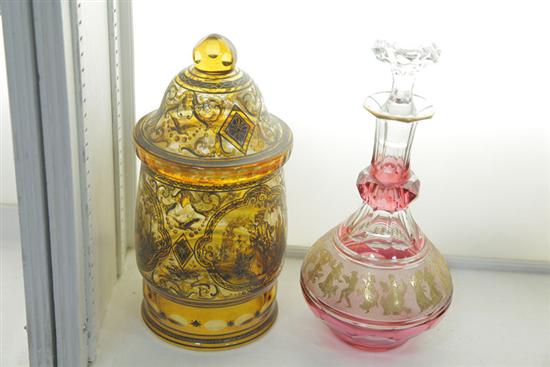 Appraisal: TWO PIECES OF BOHEMIAN GLASS Cranberry and clear stoppered decanter