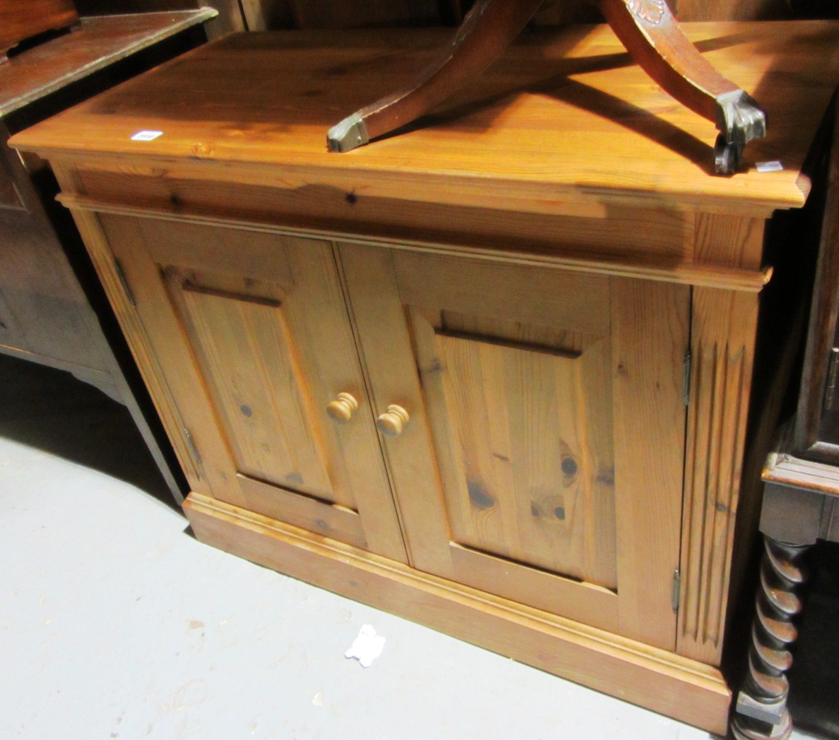 Appraisal: A th century pine sideboard with a pair of drawers