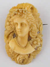 Appraisal: A finely carved Victorian ivory cameo of a lady x