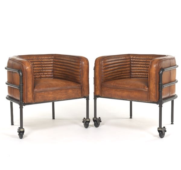 Appraisal: PAIR OF DOT BO INDUSTRIAL STYLE METAL AND LEATHER ARMCHAIRS